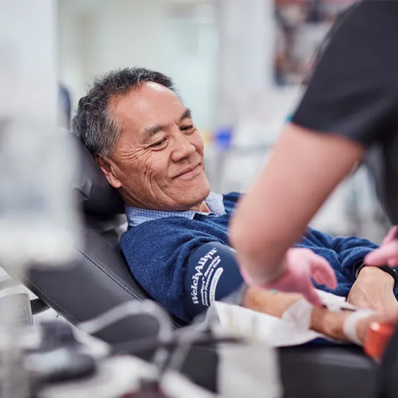 a man in a donor chair about to make a donation