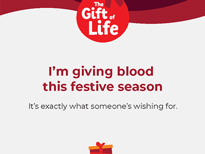 card has the following text written on it "I'm giving blood this festive season"