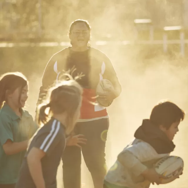 Recipient Jodie playing with kids 