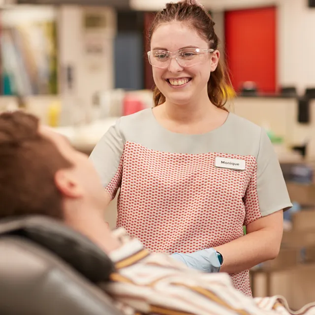 nurse smiling at donor sitting in donor chair